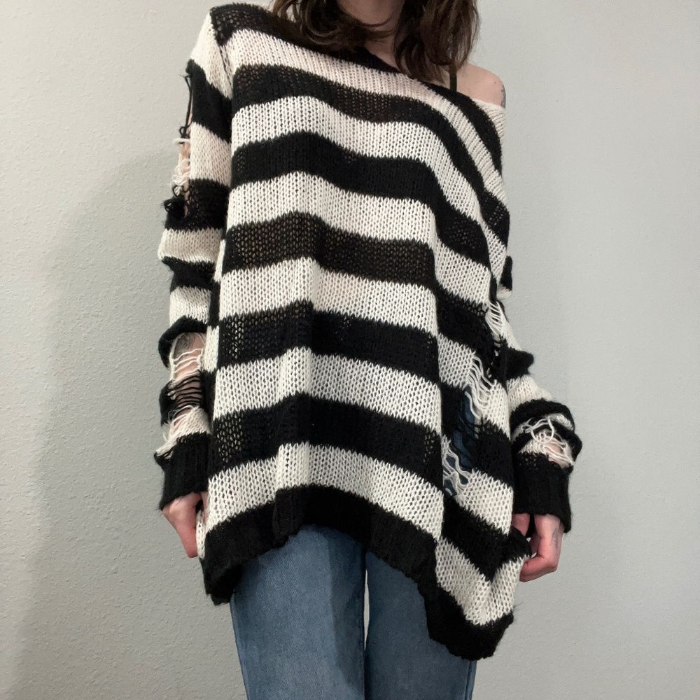 Distressed knit sweater